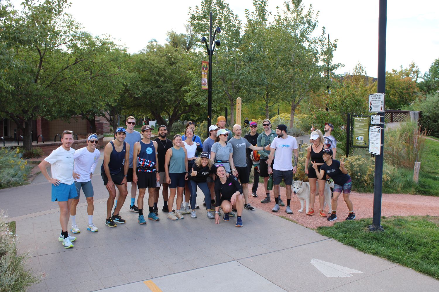 A big group of members and trainers together on the Boulder Creek path