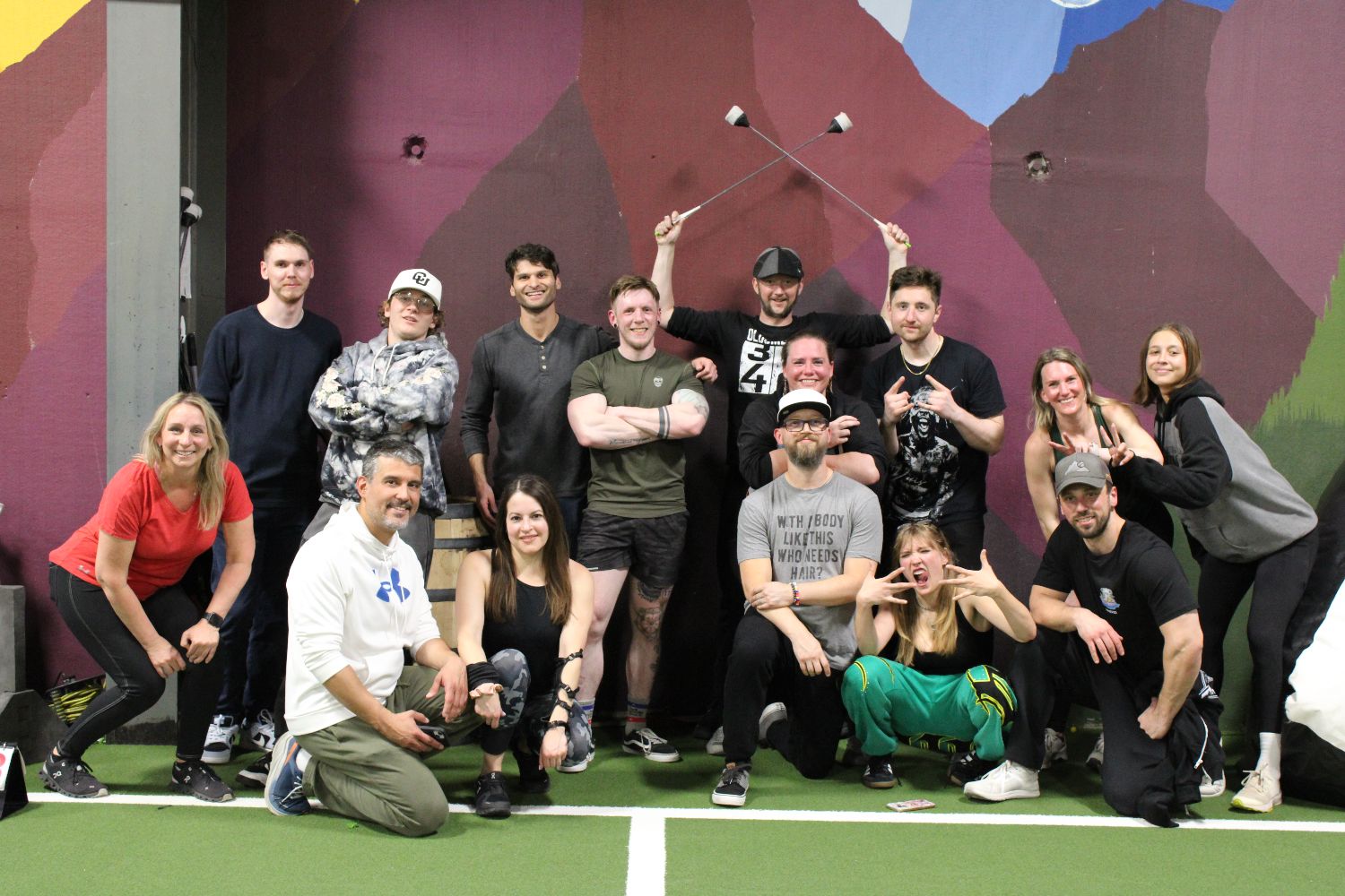 Members and trainers from ONE Boulder Fitness crowded together for a group photo