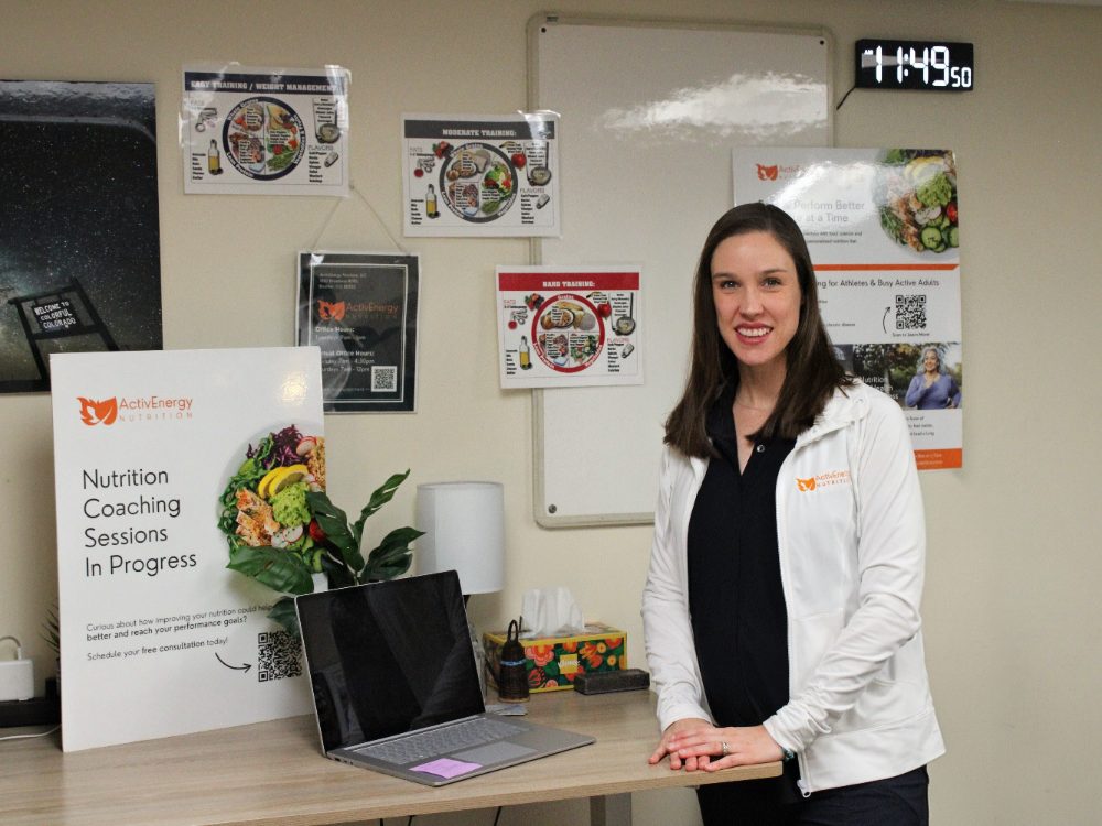 Emily Copeland, resident registered dietitian from ActivEnergy Nutrition, at her desk inside the club