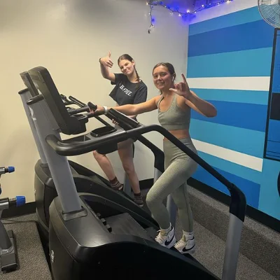 Two members on the treadmills in the cardio corner